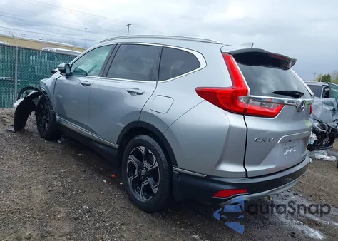 2017 Honda Cr-V Touring z USA, uszkodzony, nr VIN 5J6RW2H96HL019130